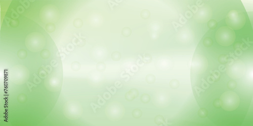 Abstract bright spring or summer landscape texture with natural green bokeh lights and yellow circular lights