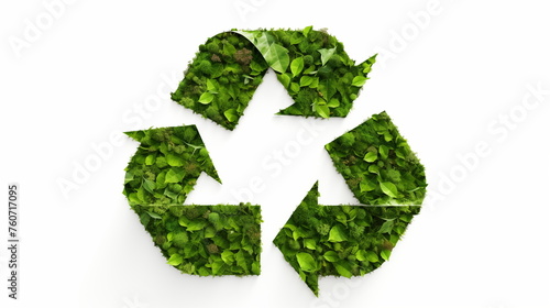 Recycle sign covered with green plants against white background