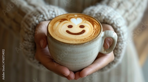 Woman hand holding a cup of coffee latte art with artistic cream smile face decoration, Happy morning, good mood, inspiration, generative ai