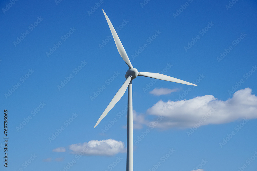 Wind turbine blades on blue sky background Wind turbine blades on blue sky background