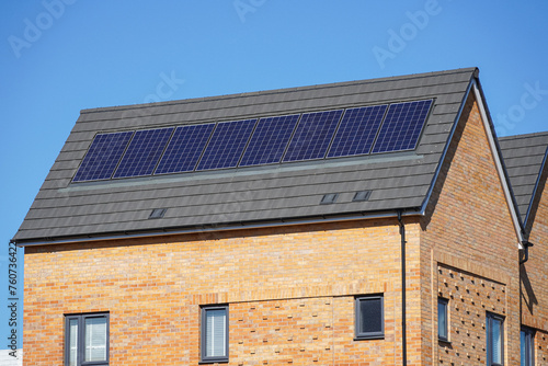 New modern apartment buildings with solar panels on the roof