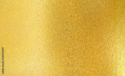 Luxury gold gradient light shiny glitter texture background. Golden shiny foil gradient metallic metal polished sheet with gloss light reflection, vibrant golden metal wall wallpaper