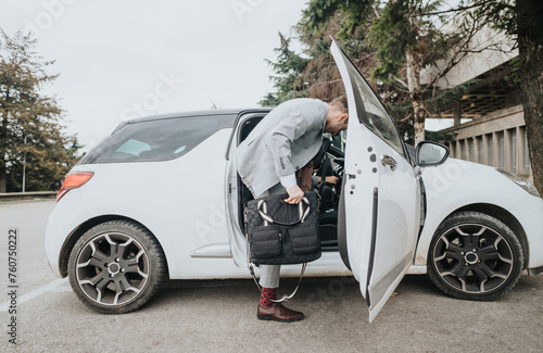 A businessperson with a bag getting into a car, depicting busy entrepreneurial life.