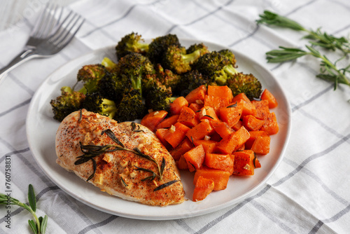 Homemade One Pan Chicken And Veggies on a Plate, side view. photo