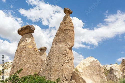 Fairy Chimneys located near Cavusin. Unique geological geological formations. Cappadocia, Nevsehir, Turkey (Turkiye)