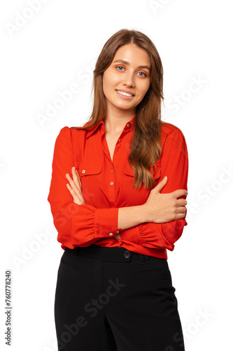 Vertical studio shot of a young woman wearing red shirt with arms crossed over white background.