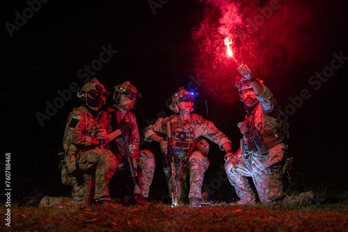 Group of solders having a discussion about the night mission © charnsitr
