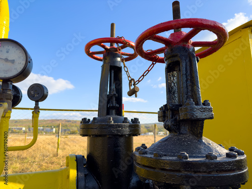 Chain with lock on gas valves. Gas shut off