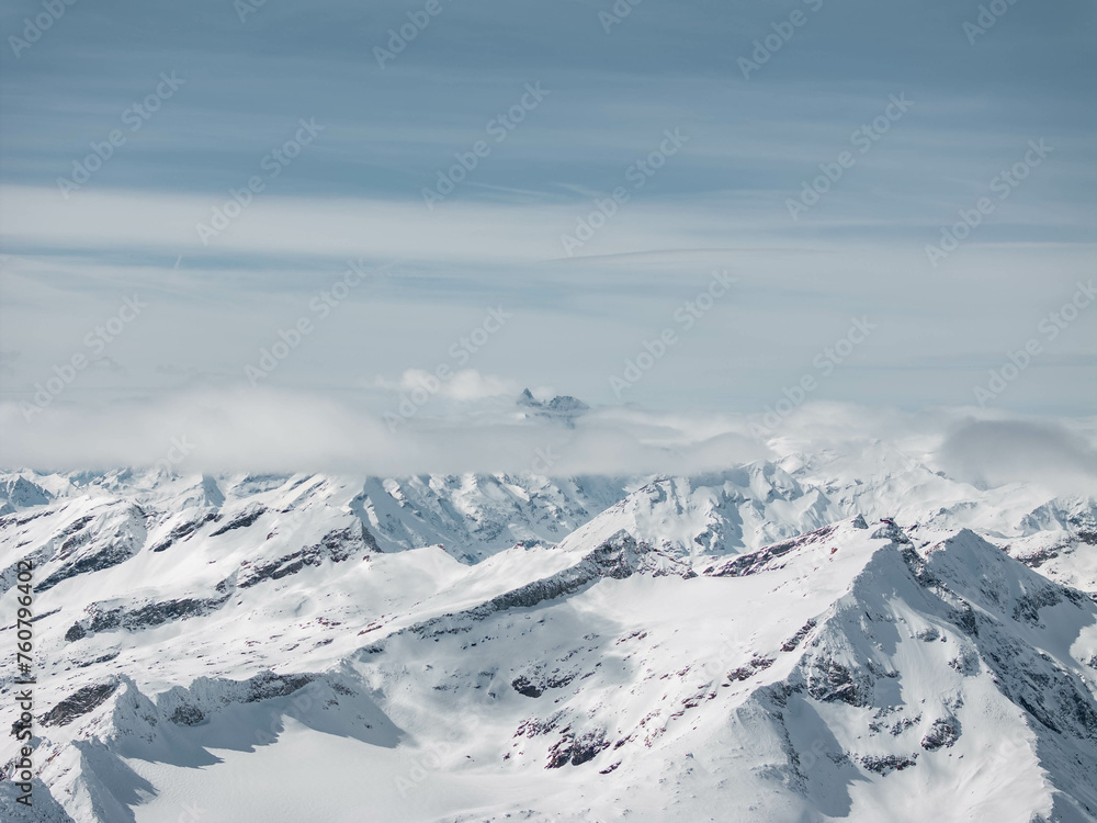 The Snowy Grossglockner covered in Clouds, Winter Landscape