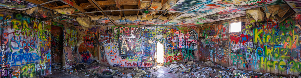 panorama of a graffiti filled building