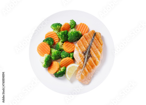 plate of grilled salmon fillet and vegetables isolated on transparent background, top view