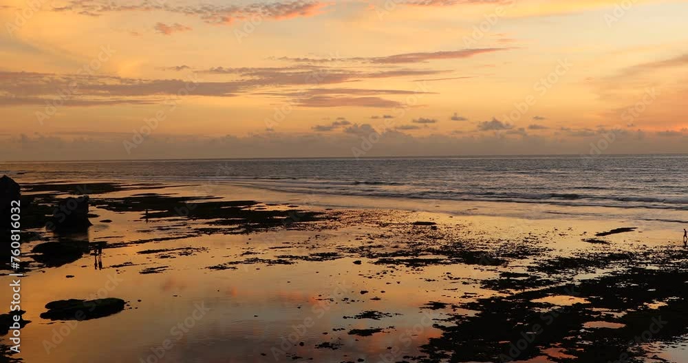 Beautiful view of Uluwatu Beach at sunset in Bali, Indonesia Beautiful view of Uluwatu Beach at sunset in Bali, Indonesia