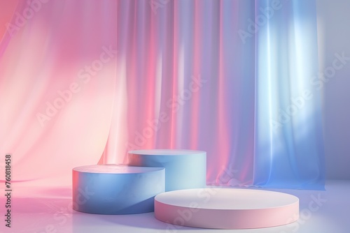 Abstract display podiums with silky draped background in soft pastel colors.