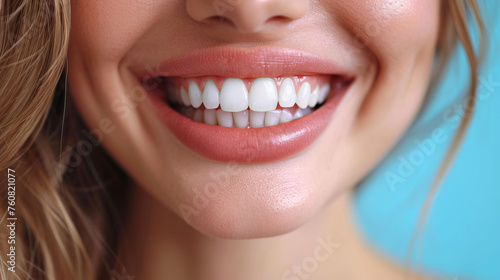 Closeup of beautiful snow-white smile. Ideal strong white teeth, teethcare. Healthcare, stomatological concept for dentists. Only smile on face, fingers near face photo