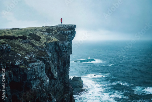 Person standing at the cliffs overlooking the ocean during a storm (ID: 760824251)