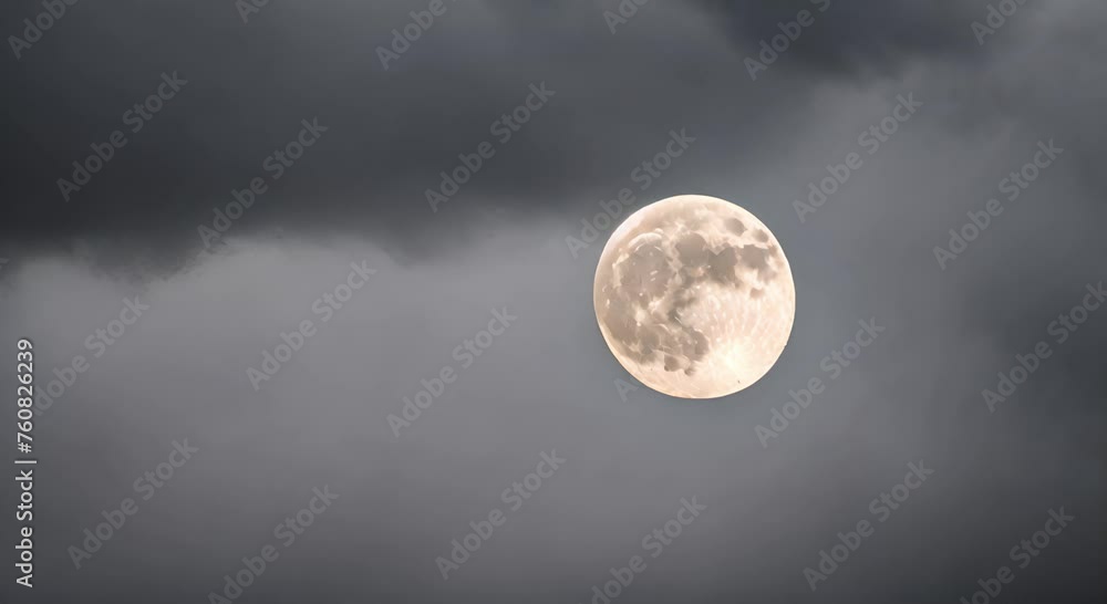 full moon covered in black clouds full moon covered in black clouds