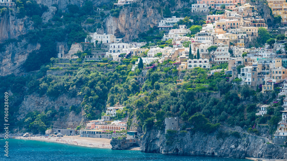 Positano city seen from afar. The Fornillo beach with the ancient Saracen tower. Amalfi Coast ITALY