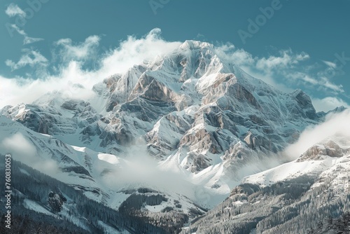 Majestic Snow-Covered Mountain Under Blue Sky