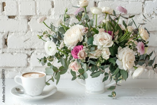 White Table with Flower Bouquet, Coffee Cup on White Brick Wall Background, Morning Greeting Card
