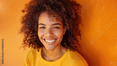 Young 20 Year Old Mixed Race Girl With Curly Hair Looking At Camera Smiling And Happy On A Vibrant Yellow Background. Generative AI.