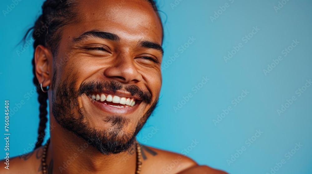 Portrait Of A Young Native Man With Perfect Smile On A Blue Background. Generative AI Portrait Of A Young Native Man With Perfect Smile On A Blue Background. Generative AI