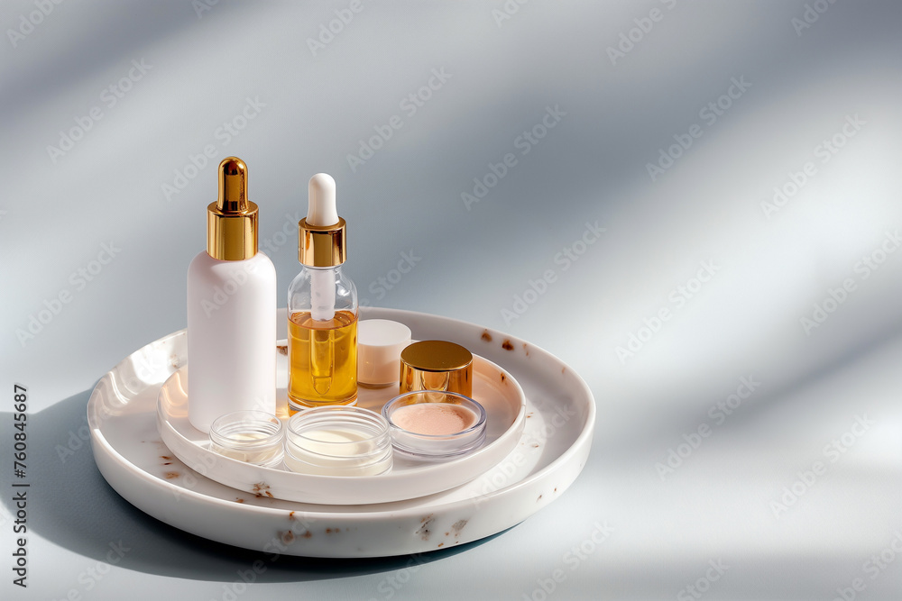 Skin care essence serum bottles with dropper and face cream on marble cosmetic tray on light background. Vitamins for skin. Hydrating anti aging serum and cream with collagen and peptides. Cosmetics Skin care essence serum bottles with dropper and face cream on marble cosmetic tray on light background. Vitamins for skin. Hydrating anti aging serum and cream with collagen and peptides. Cosmetics
