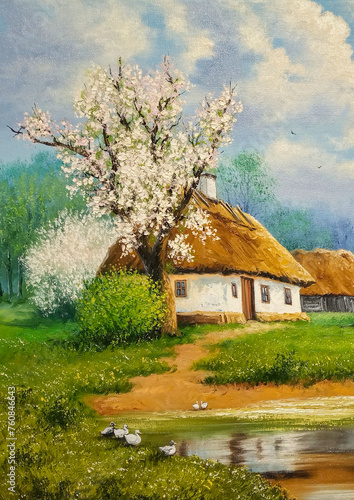 Spring rural landscape with a blooming garden near old retro houses with thatched roofs. Rustical landscape, oil paintings rural landscape, fine art, artwork, in the old village.