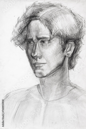 Study portrait of guy hand-drawn by graphite pencil on white paper