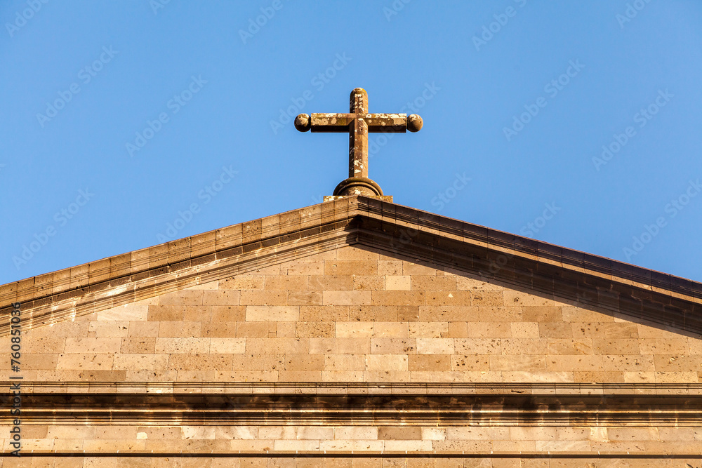 Top of a catholic church roof with cross Top of a catholic church roof with cross