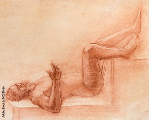 educational drawing of lying nude male model on podium drawn by hand by sanguine pastel on yellow paper