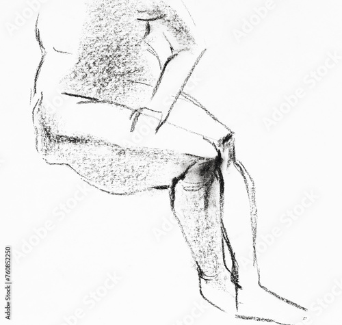 training sketch of legs of sitting mature female nude model hand-drawn in black sauce pastel on white paper