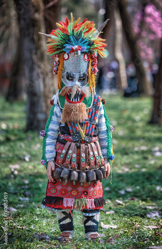 The child in a costume with a mask