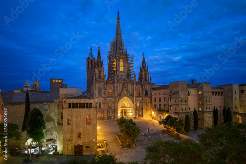 Twilight Blue Hour high angle view of the Gothic Barcelona Cathedral and Square in the El Born medieval district of the historic center of Barcelona.	