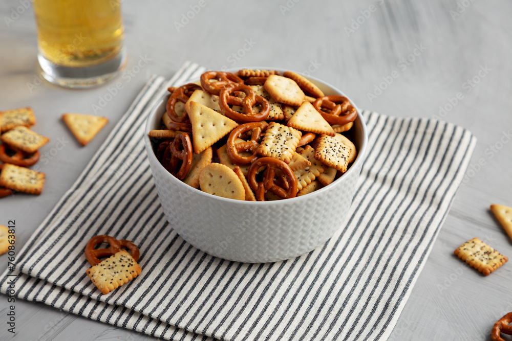 Homemade Cracker Snack Mix with Pretzels in a Bowl, side view. Homemade Cracker Snack Mix with Pretzels in a Bowl, side view.