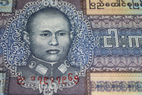 Closeup portrait of burmese politician and father of the nation Aung San on old Myanmar Kyat  currency banknote photo