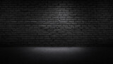 A black brick wall with black textured background and light shining on it, for product presentation, template, banner or presentation page and web banner