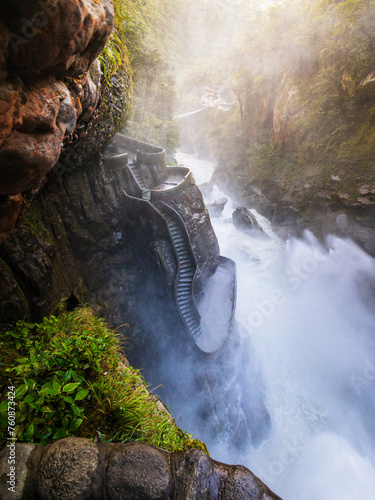 Pailon del Diablo cascades around big waterfall  photo