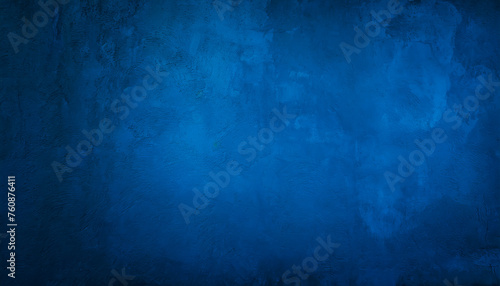 A blue texture background, blue plaster wall, with light spots of light, as a background, template, banner or page.