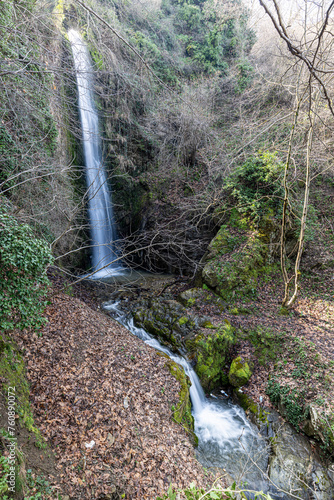 Babadag Yardan Waterfall. Yardan waterfall in mountain forest under blue sky. Babadag, Denizli, Turkey. photo