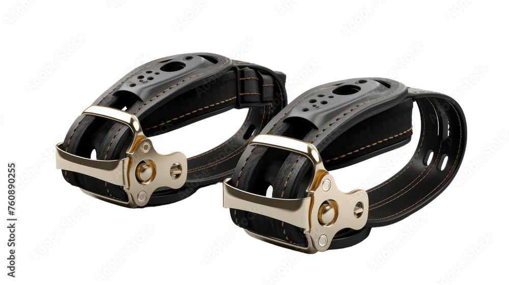 Sleek black leather cuffs with intricate gold buckles resting against a dark background Sleek black leather cuffs with intricate gold buckles resting against a dark background