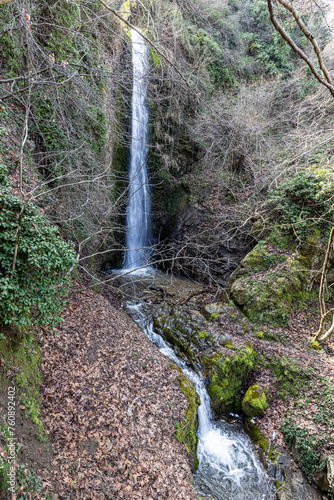 Babadag Yardan Waterfall. Yardan waterfall in mountain forest under blue sky. Babadag, Denizli, Turkey. photo