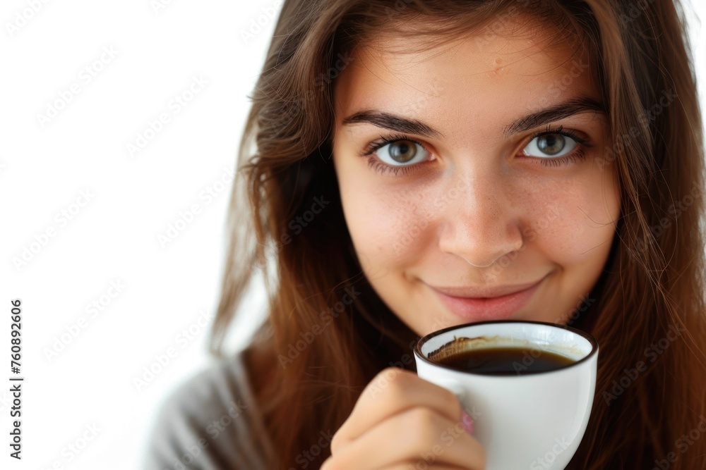 Portrait of a cute woman drinking coffee isolated on a white background Portrait of a cute woman drinking coffee isolated on a white background