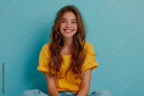 Middle age beautiful woman wearing casual shirt standing over isolated blue background happy face smiling  photo