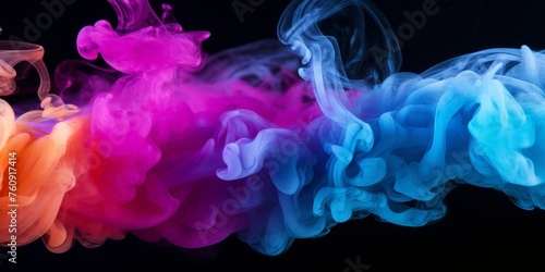 Assorted Colored Smokes on Black Background