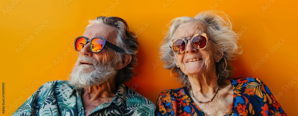 elderly couple old people on a yellow background in a fashionable image