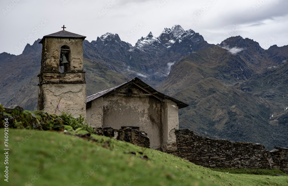 church in mountain clouds