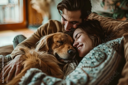 Couple with dog on couch