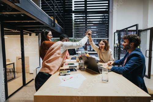 Business team working late, analyzing stats, discussing strategies for business growth, ensuring project completion, driving sales, increasing productivity. photo