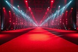 A red carpeted hallway with lights shining down on it