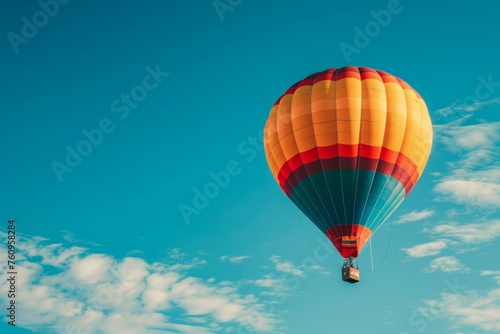 A hot air balloon is floating in the sky